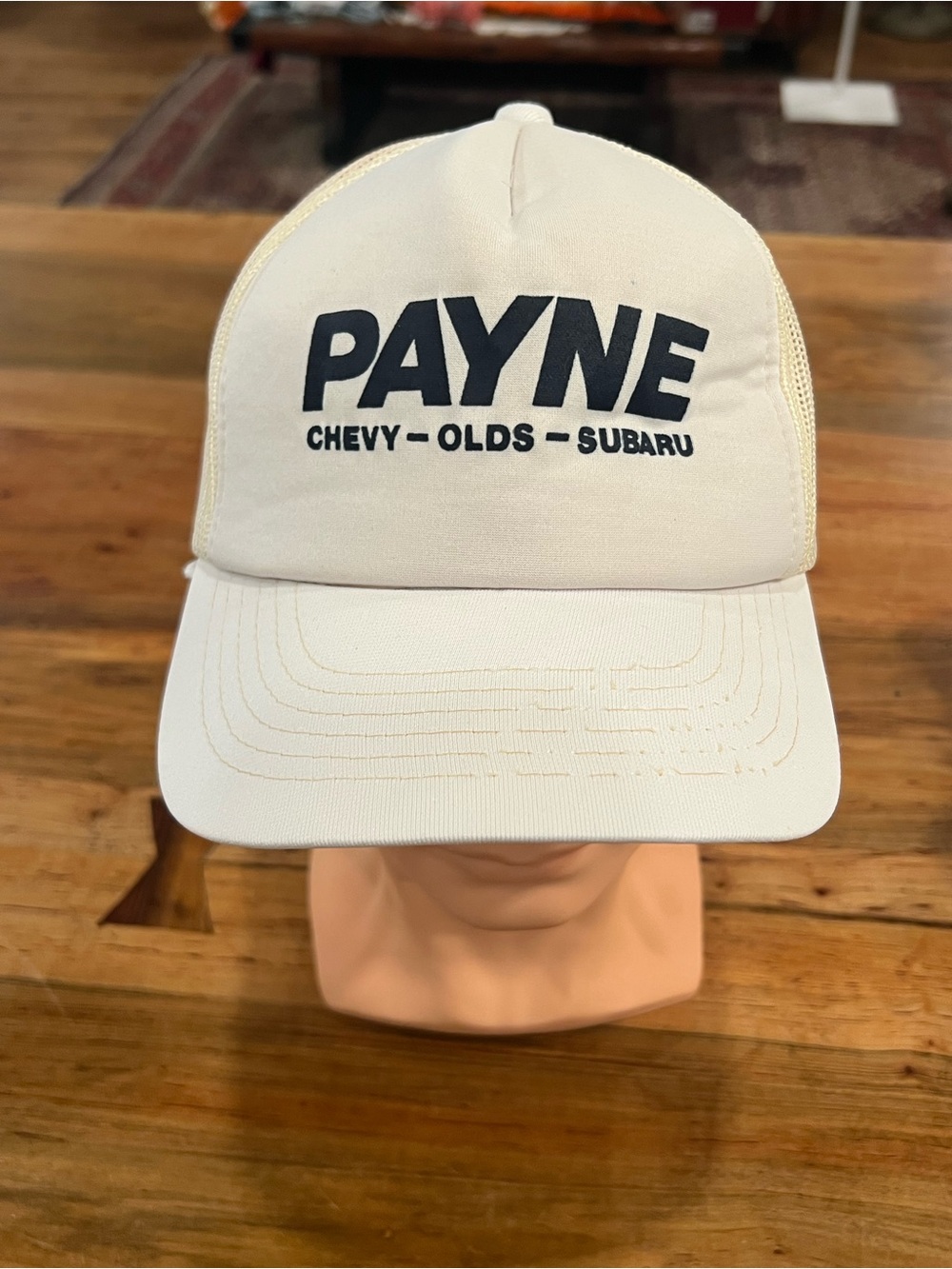 Cream Trucker Hat with Black Logo